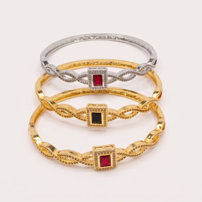 Silver Twisted Designer Bangle with Red Crystal Stone | noorposh.pk