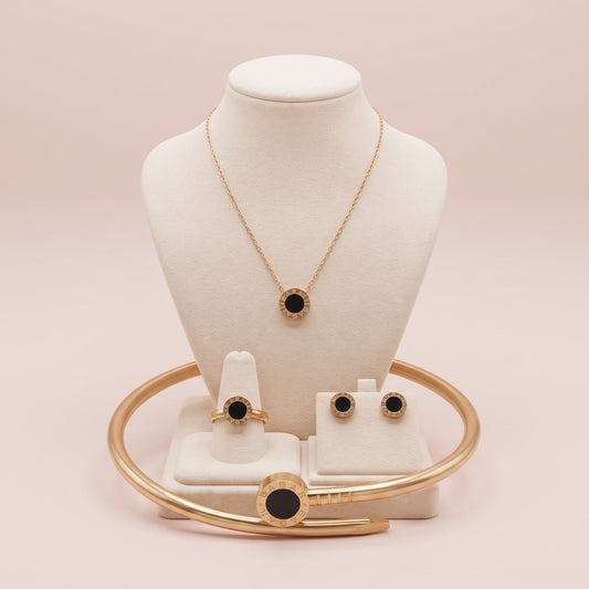 NoorPosh.pk Premium Black & Gold Stainless Steel Complete Jewelry Set – Luxury Necklace, Ear Studs, Ring & Hand Cuff