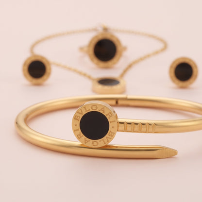 NoorPosh.pk Premium Black & Gold Stainless Steel Complete Jewelry Set – Luxury Necklace, Ear Studs, Ring & Hand Cuff