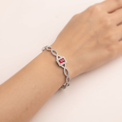 Silver Twisted Designer Bangle with Red Crystal Stone | noorposh.pk
